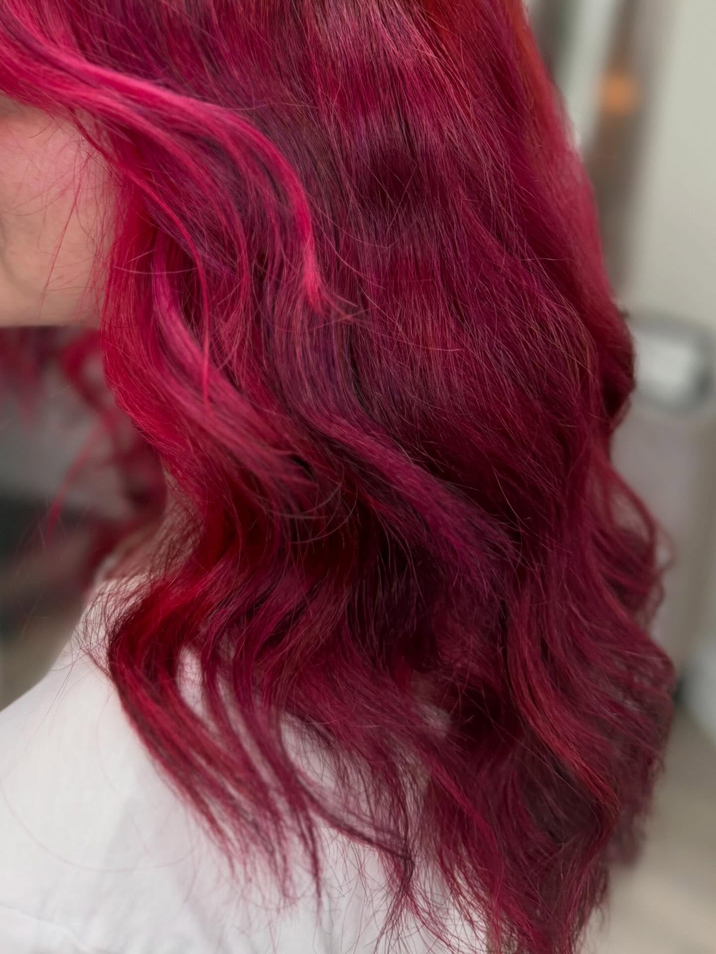Glossy raspberry red waves