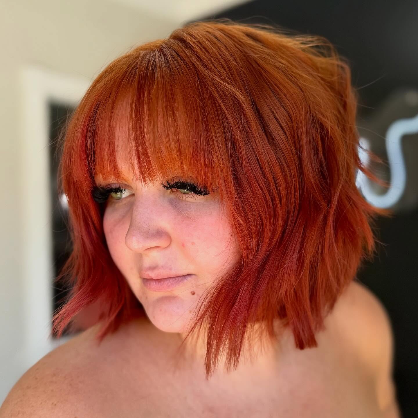 Vibrant copper bob with fringe